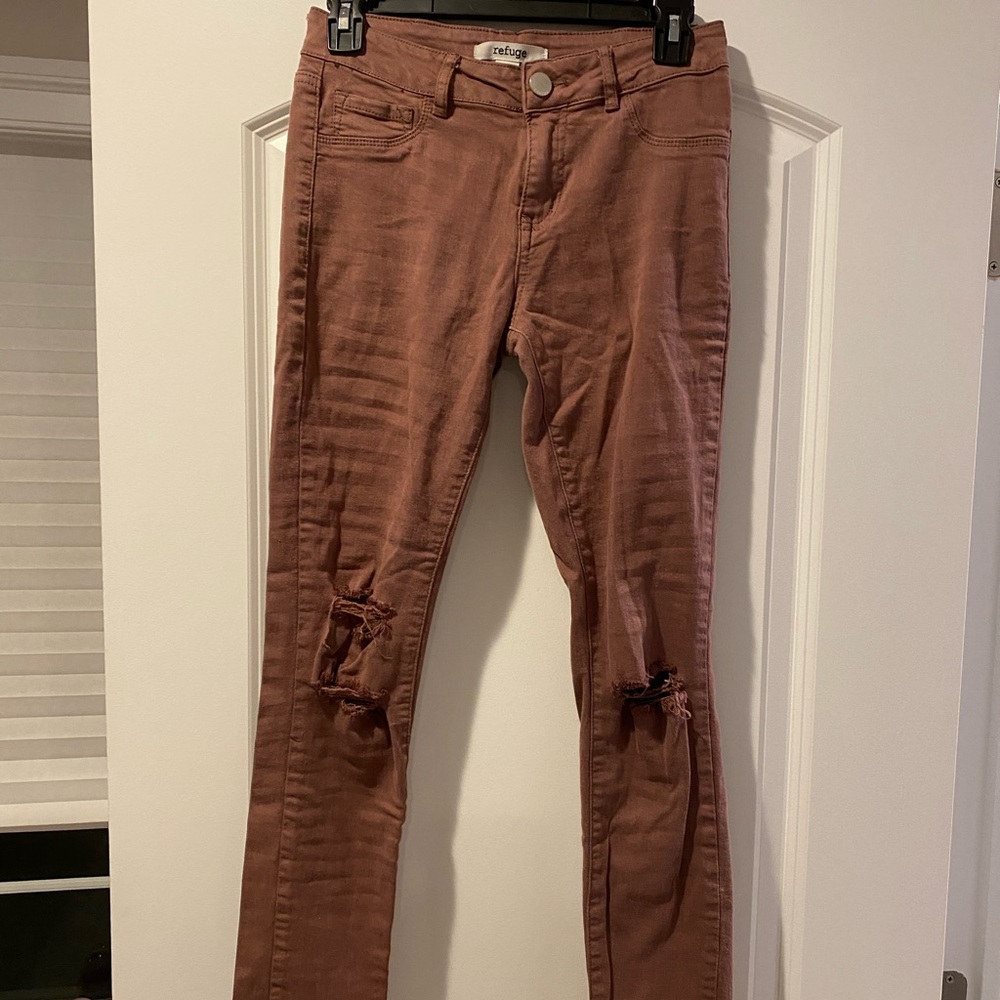 Mauve distressed skinny jeans